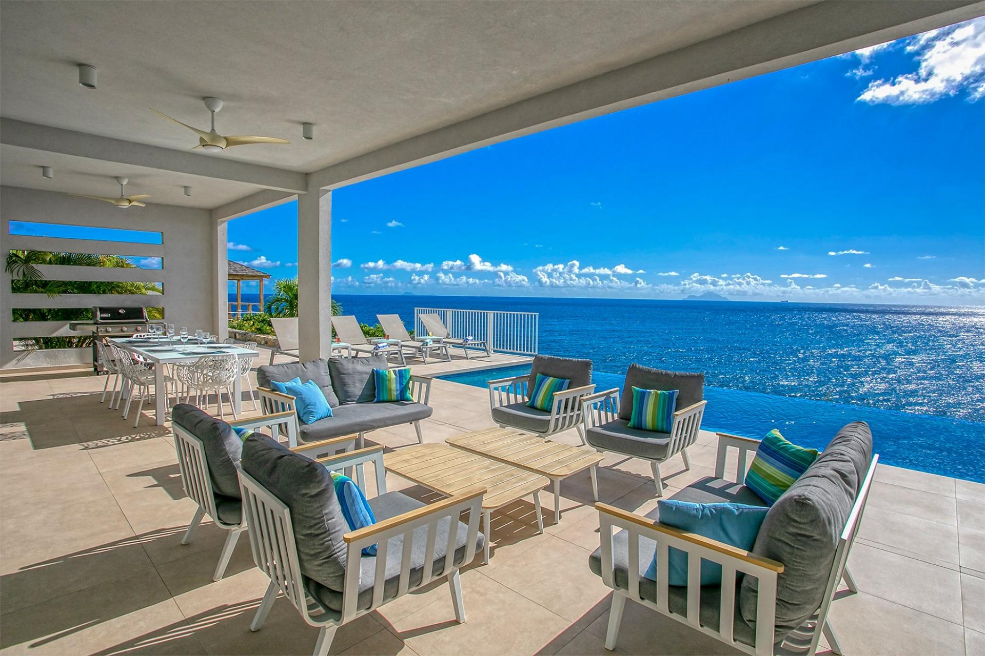 Location villa St Martin - Piscine et salon exterieur
